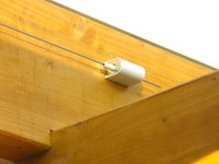 Seilspanner Universal mit ca. 6 cm Abstand zum Glas der Terrassenberdachung