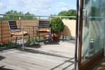 bersicht Dachterrasse mit Sitzecke und Balkonverkleidung  