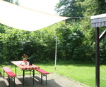 Sonnensegel konkav ber Terrasse mit Alu-Teleskopmast