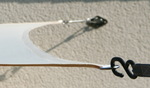 Spanngurt mit Haken an einer Segelecke, Spannschlo hausseitig